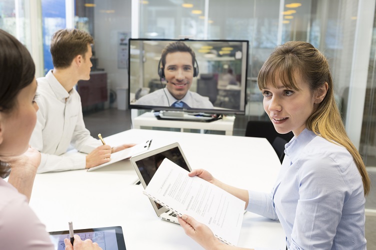 A Skype Conference with a Customer in a 3D Rendering Firm