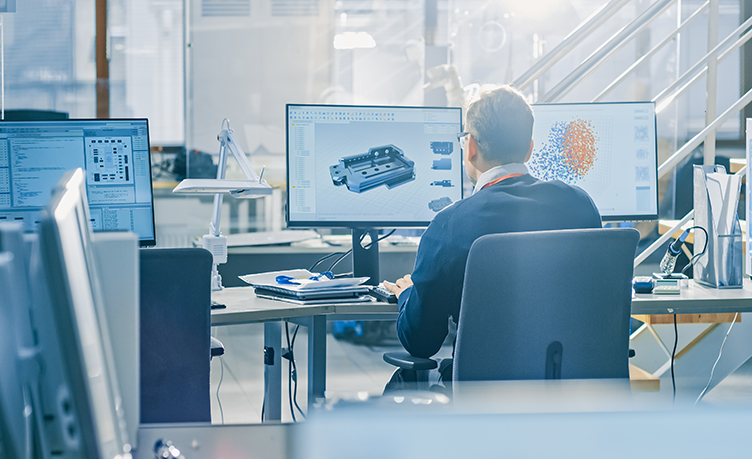 3D Artist Creating 3D Models at His Workstation