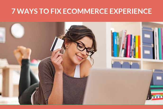 Ecommerce customer experience: Woman holding a bank card while shopping on a laptop at home