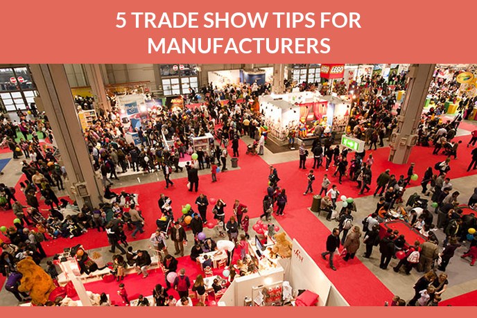 Trade show marketing: Crowded trade show floor seen from above with red carpet aisles between the stands