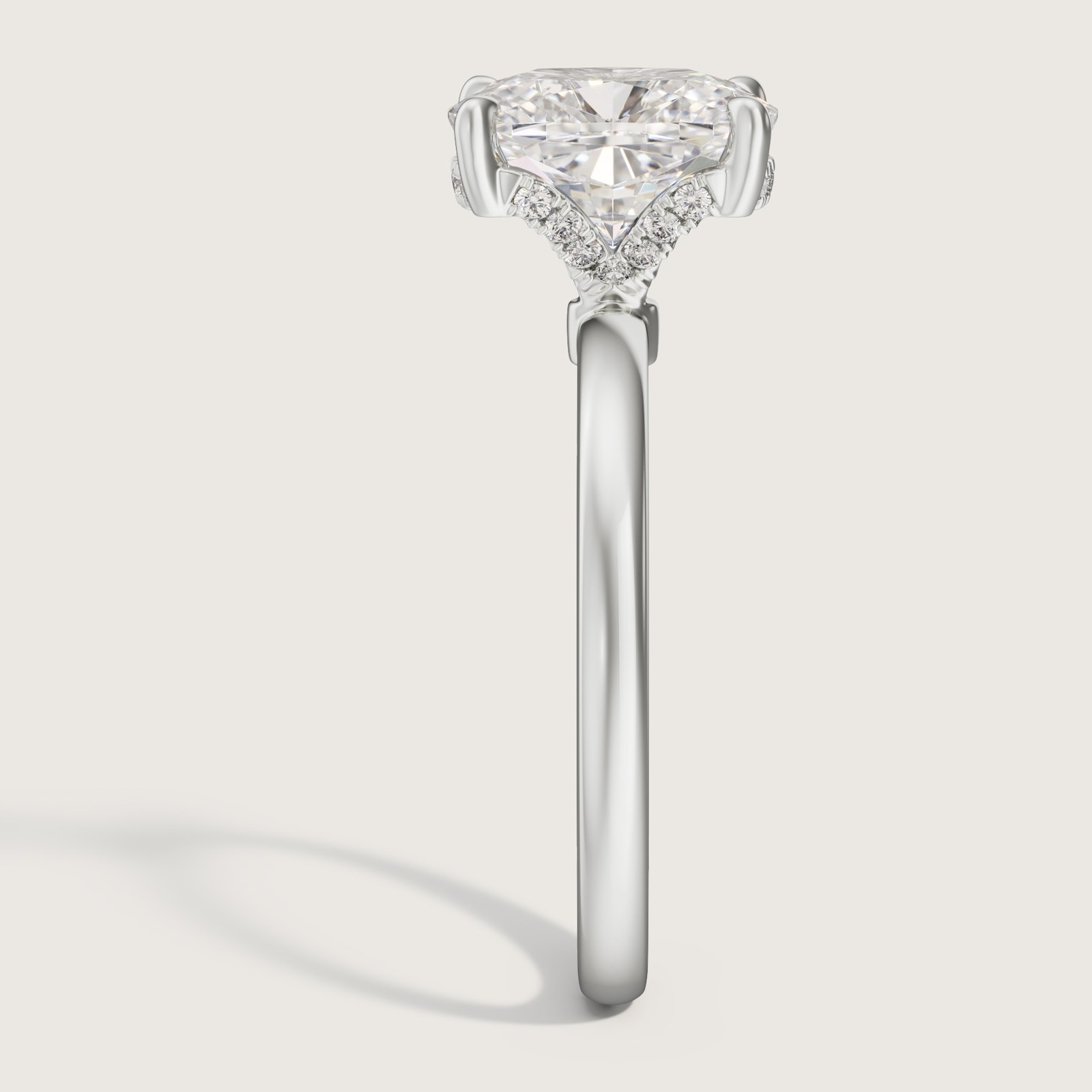 Side render of the white gold ring showing the hidden halo and flared gallery