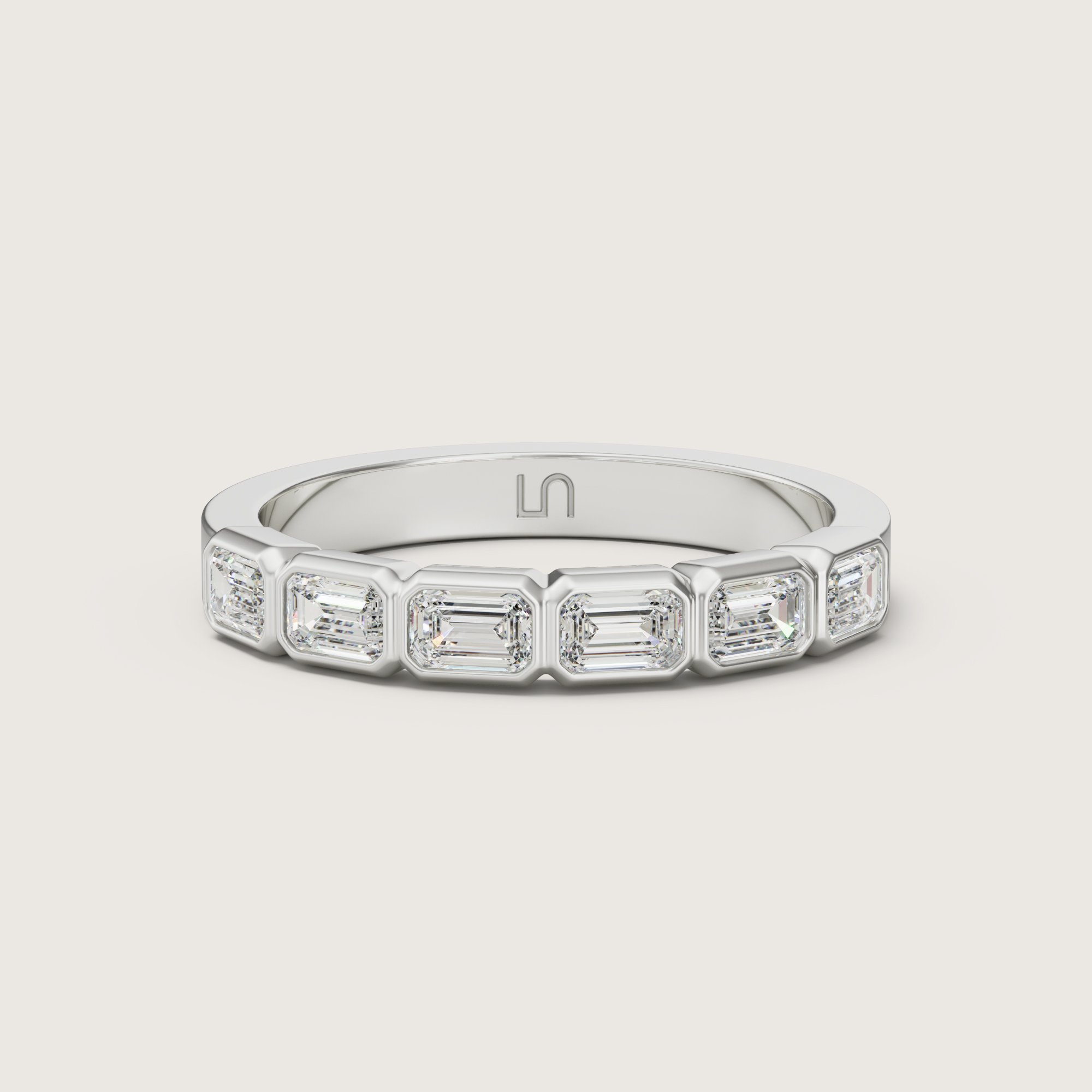 3D render of the Lindelli Domino emerald-cut diamond band in white gold, flat view