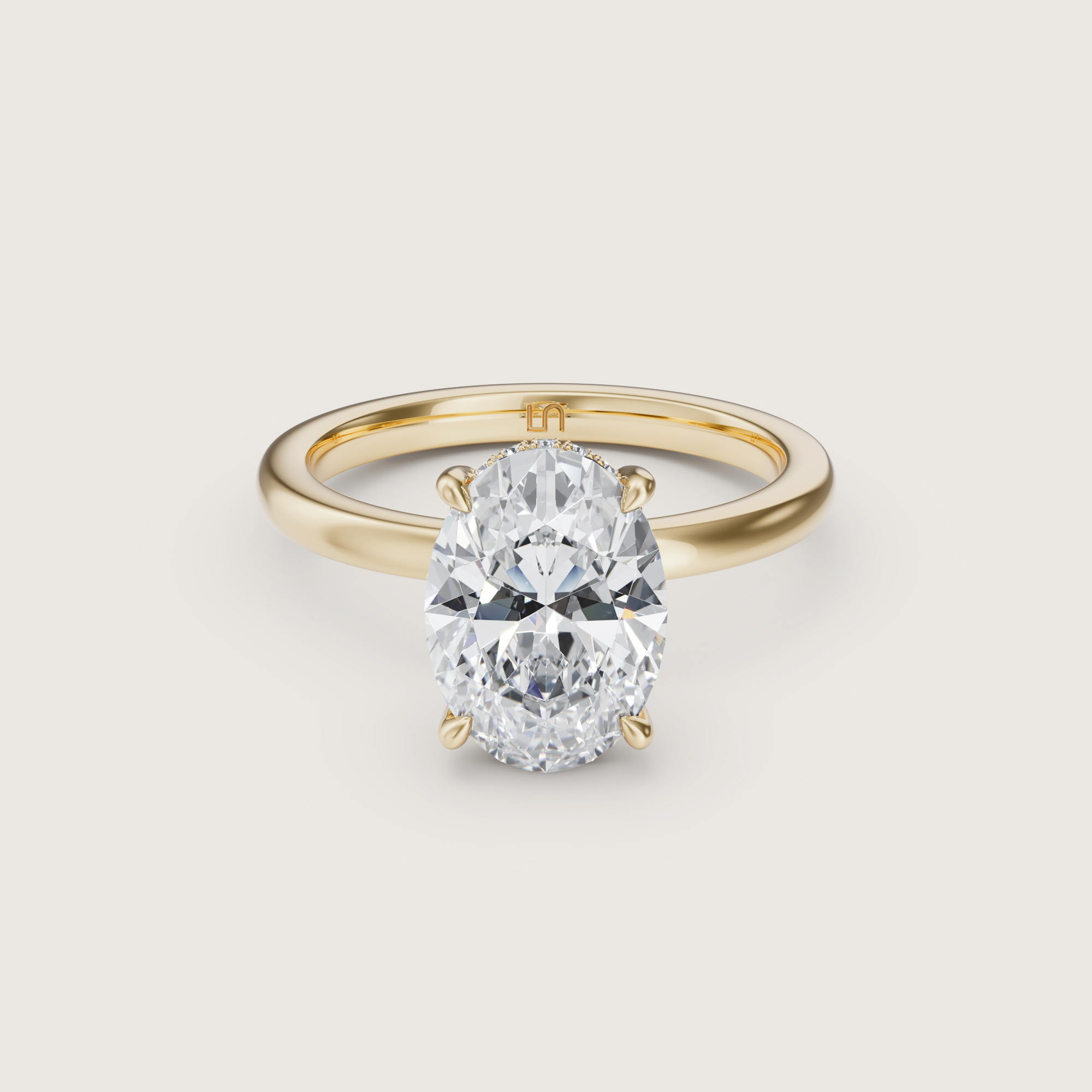 3D render of a hidden halo oval ring in yellow gold, flat view
